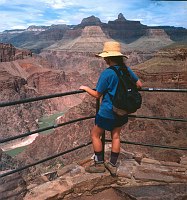 HIKER VIEWING THE COLORADO RIVER FROM PLATEAU POINT, A 12.5 MILE ROUND TRIP FROM THE BRIGHT ANGEL TRAILHEAD IN GRAND CANYON VILLAGE, GRAND CANYON N.P. NPS PHOTO. 
